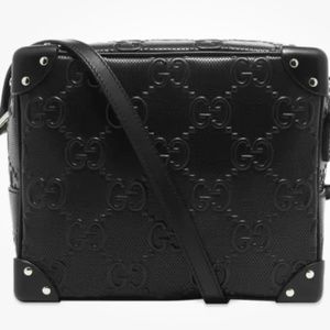 Gucci embossed leather crossbody black bag